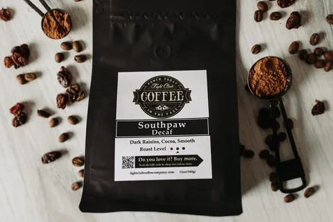 Southpaw Decaf coffee bag with dark raisins and cocoa